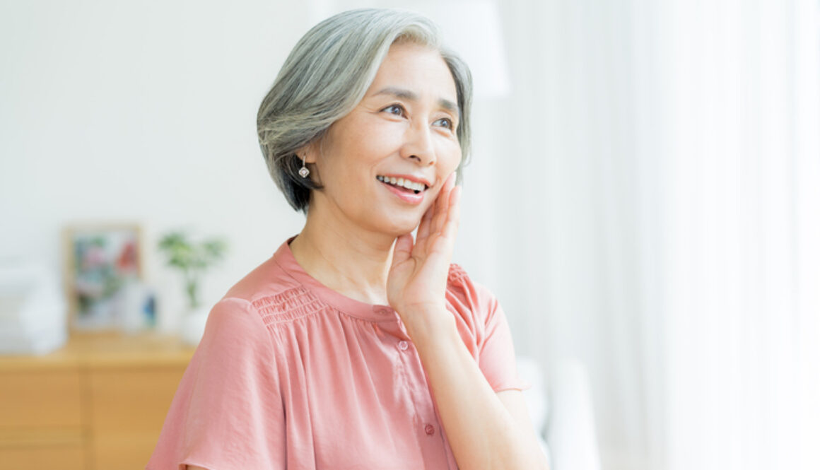 Senior woman doing skin care