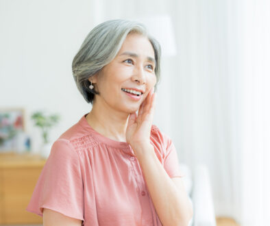 Senior woman doing skin care